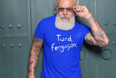 Man wearing Turd Ferguson Tee Shirt